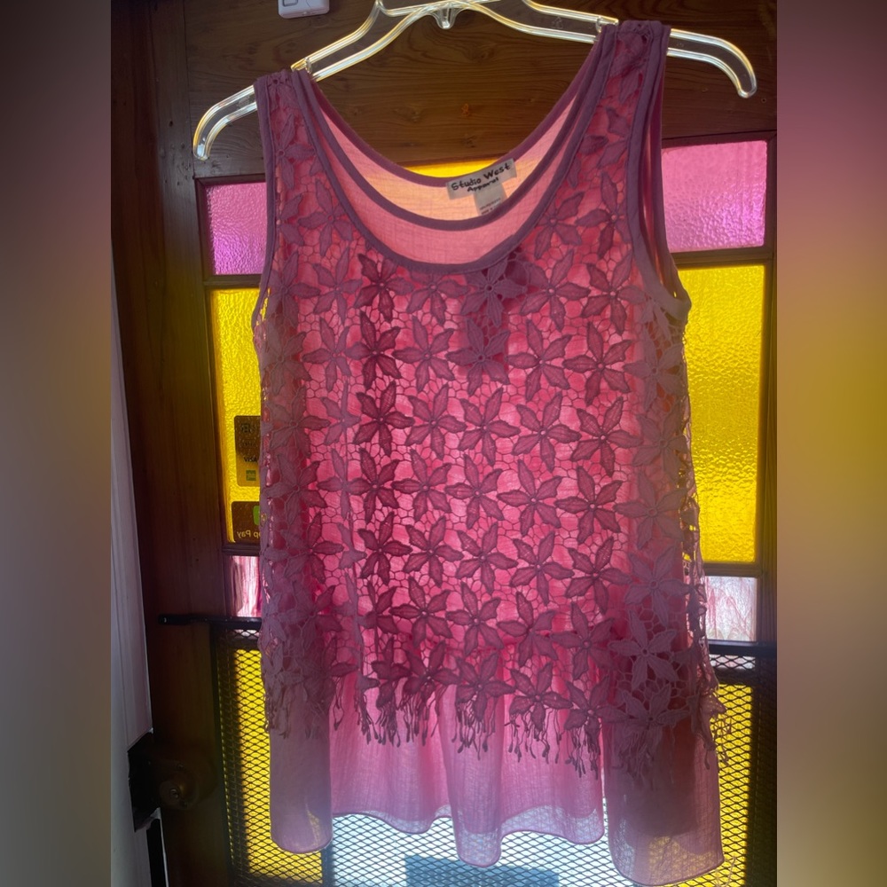 Size small pink women’s blouse.